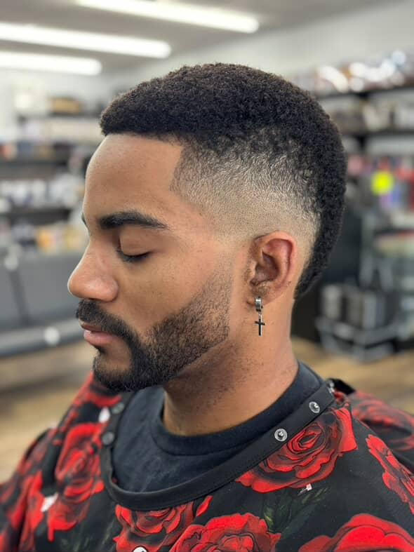 Finished fade and precisely shaped beard at Ivan's Barbershop